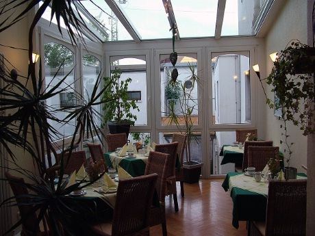 Frokostsal på Hotel Residence like ved jernbanetasjonen